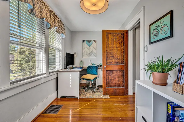 a room with furniture and a window