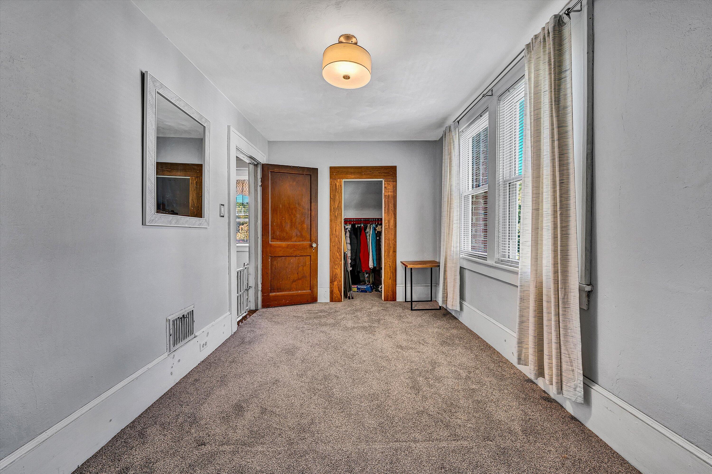 1013 Howbert Avenue Southwest Roanoke, VA 24015 - Photo 46 of 52 a view of empty room with floor to ceiling window