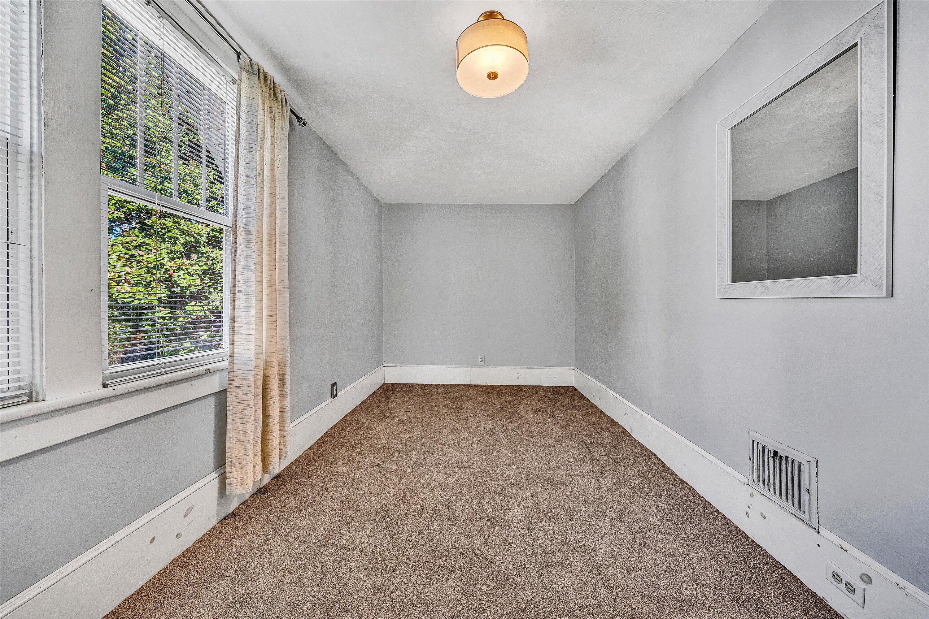 1013 Howbert Avenue Southwest Roanoke, VA 24015 - Photo 47 of 52 a view of an empty room with a window