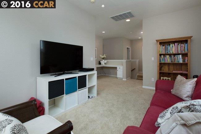 2153 North Donovan Way San Ramon, CA 94582 - Photo 14 of 15 a living room with furniture and a flat screen tv