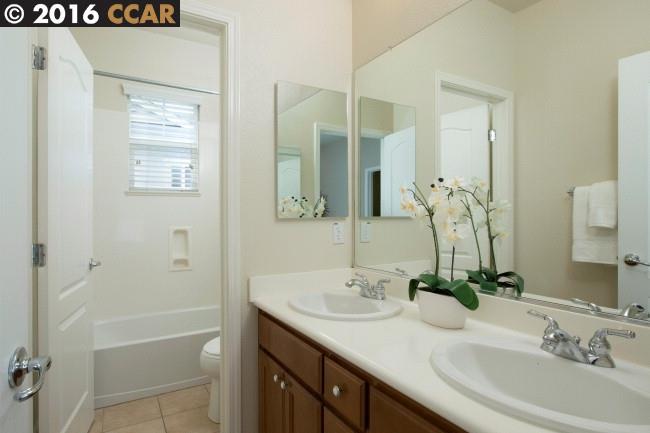2153 North Donovan Way San Ramon, CA 94582 - Photo 8 of 15 a bathroom with a sink and a mirror