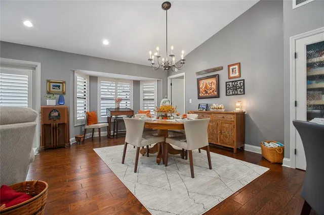 a bed room with a bed and a flat screen tv