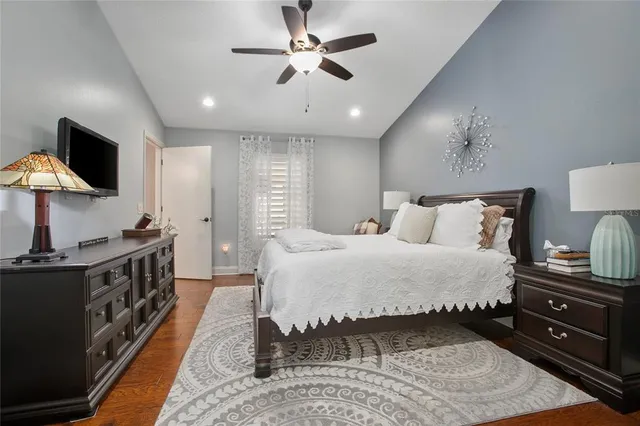 a view of an entryway with wooden floor