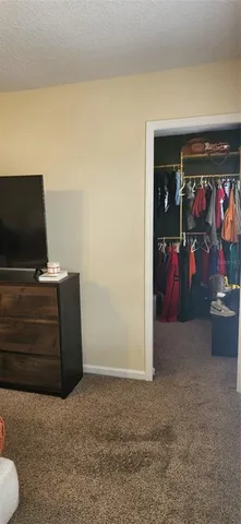 a bathroom with a toilet and a bathtub