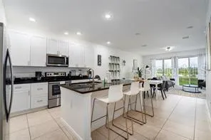 a view of kitchen with sink and counter space