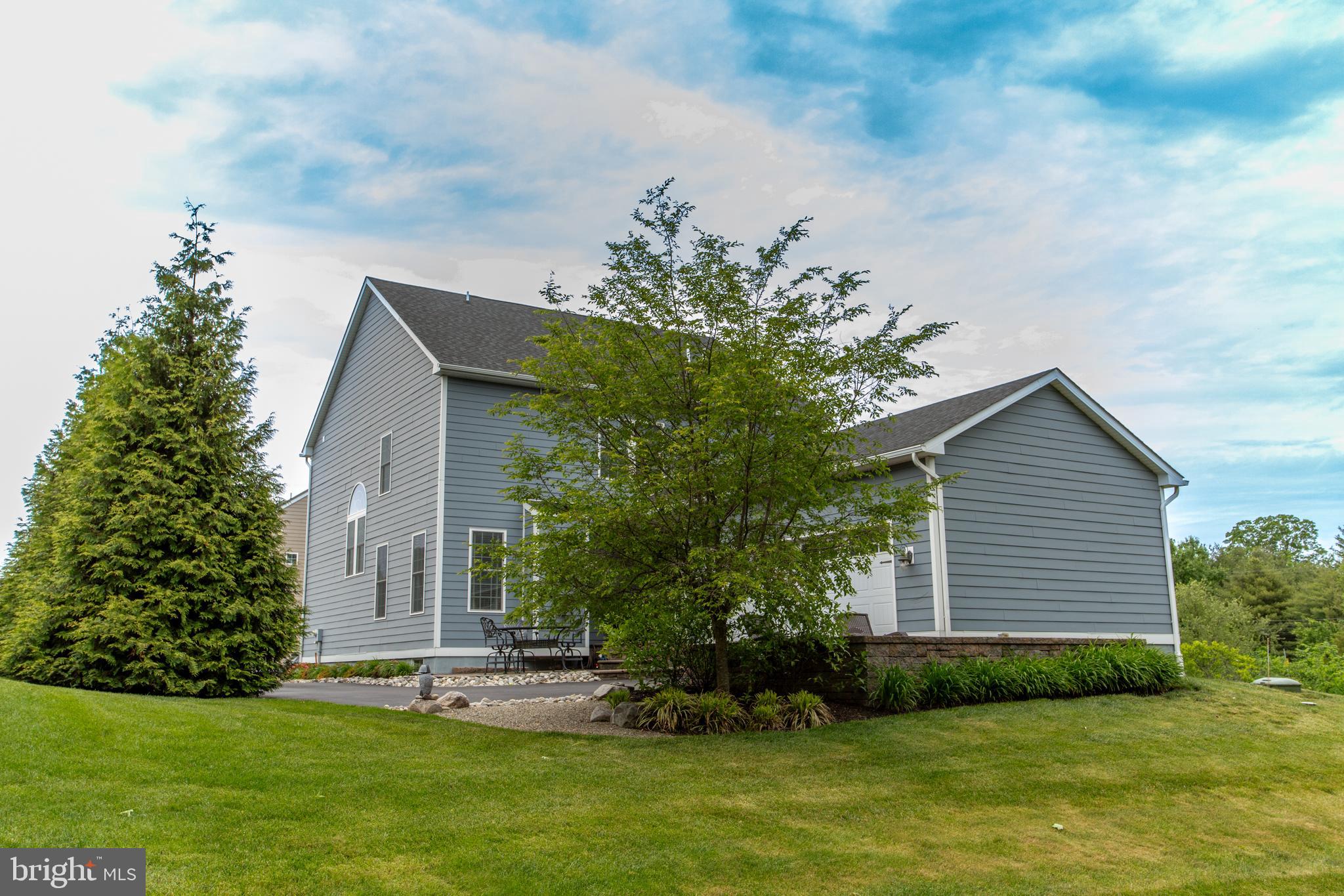 4682 Plough Tavern Road Doylestown, PA 18902 - Photo 42 of 42 a house that has a tree in front of it