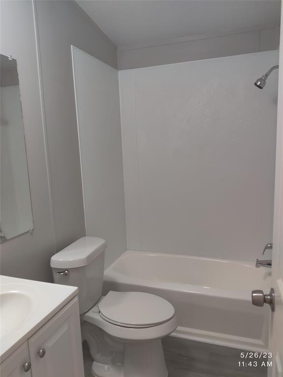 307 Jones Circle Pottsboro, TX 75076 - Photo 11 of 11 a white toilet sitting next to a bath tub