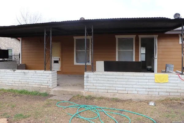 a view of a lake with a car park side of the road