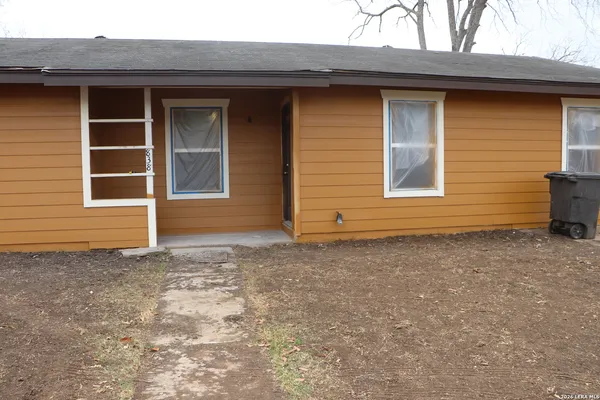 a view of staircase with white walls