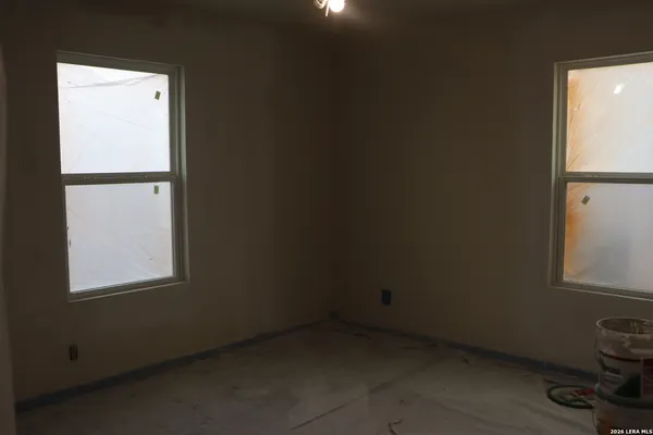a room with window and a wooden floor