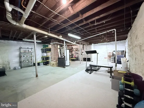 a view of a garage with wooden walls