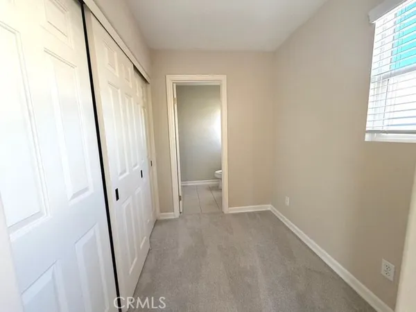 a view of an entryway with a window