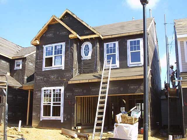a front view of a house with a porch