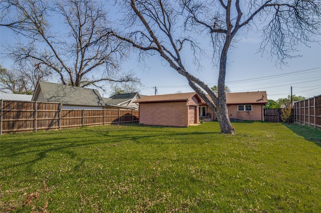 433 Fulton Street Denton, TX 76201 - Photo 24 of 25 a view of a house with a yard
