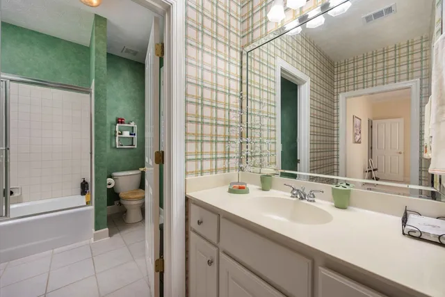 a bathroom with a shower and a bathtub