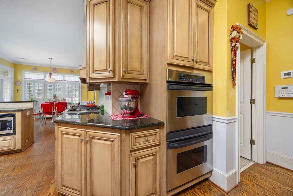 172-6 Almond Ridge Drive Fortson, GA 31808 - Photo 27 of 52 a kitchen with stainless steel appliances a stove a sink and cabinets
