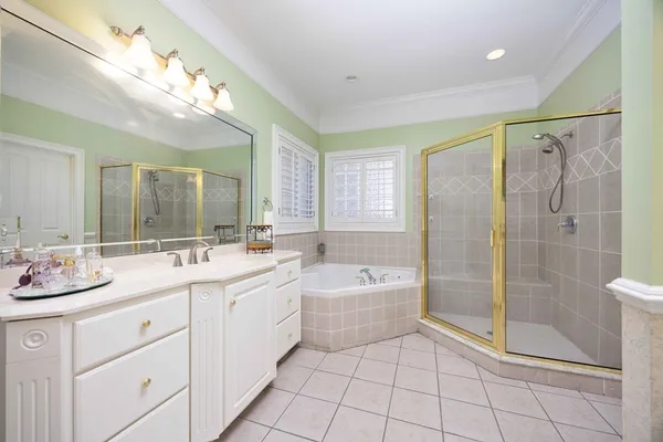 a room with furniture and mirror