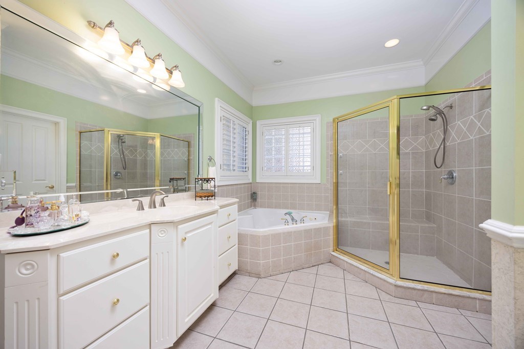 172-6 Almond Ridge Drive Fortson, GA 31808 - Photo 30 of 52 a spacious bathroom with a shower sink mirror and