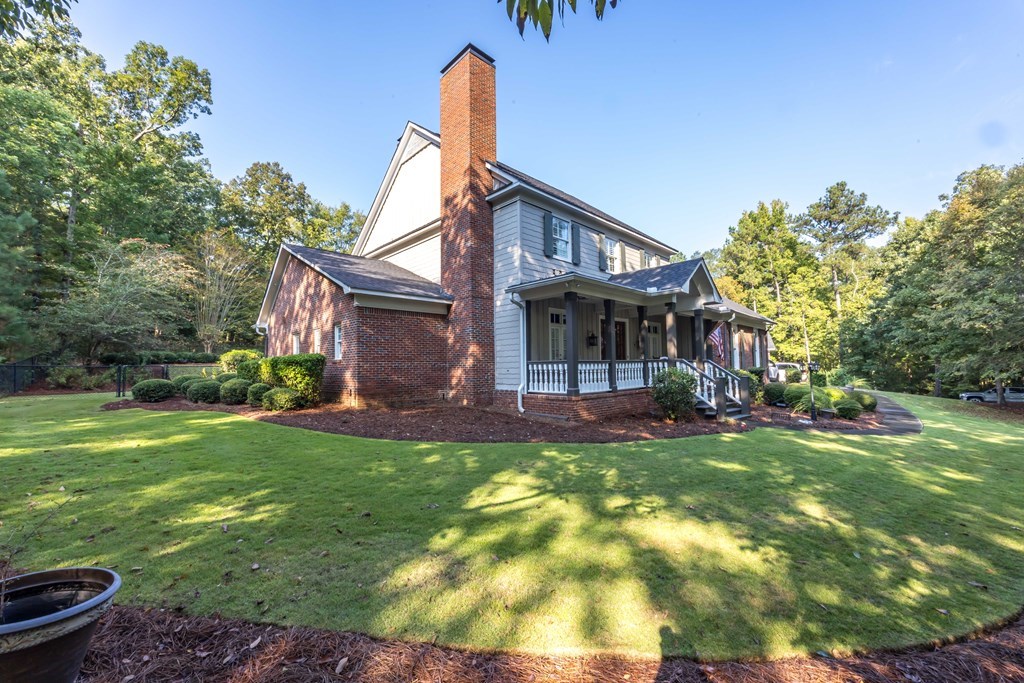 172-6 Almond Ridge Drive Fortson, GA 31808 - Photo 32 of 52 a view of a house with a yard porch and sitting area