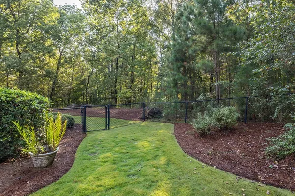 a view of a backyard with a garden