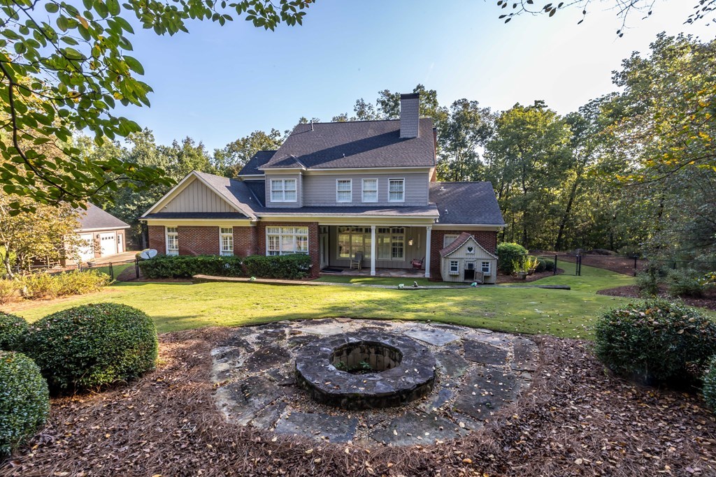 172-6 Almond Ridge Drive Fortson, GA 31808 - Photo 39 of 52 a front view of a house with a yard and balcony