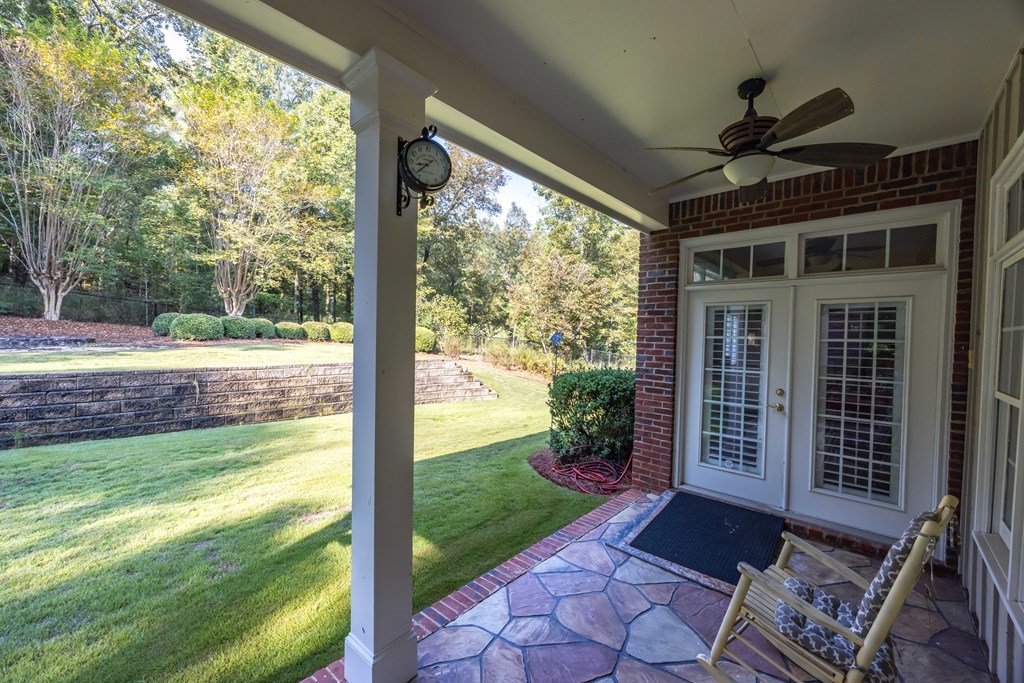 172-6 Almond Ridge Drive Fortson, GA 31808 - Photo 42 of 52 a view of a porch with a floor to ceiling window and wooden fence