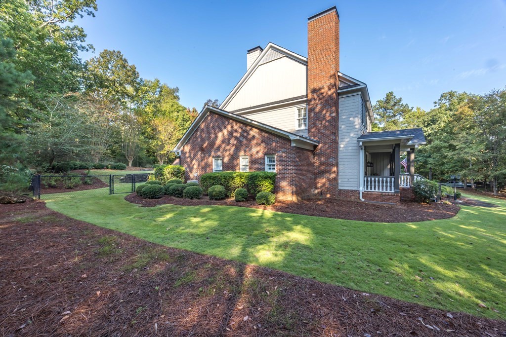 172-6 Almond Ridge Drive Fortson, GA 31808 - Photo 46 of 52 a view of a house with backyard and a tree