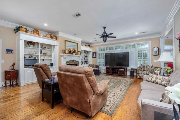 a bathroom with a sink mirror and toilet