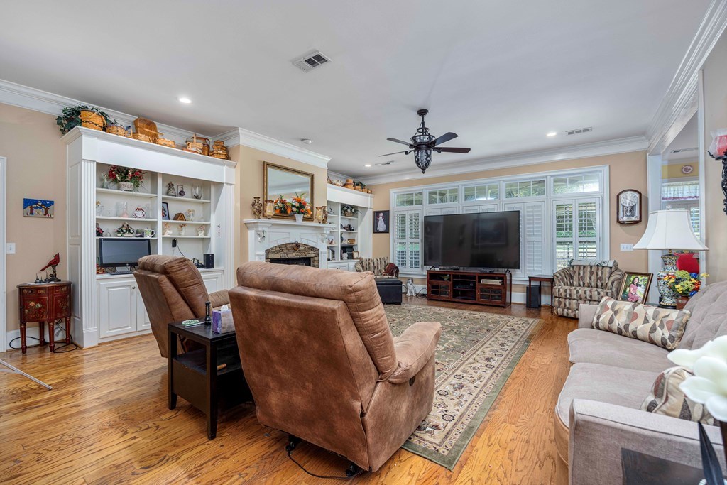 172-6 Almond Ridge Drive Fortson, GA 31808 - Photo 10 of 52 a living room with furniture a flat screen tv and a table