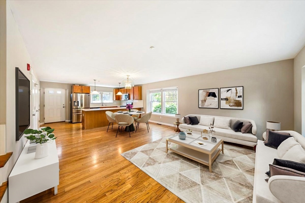 6 Bates Street, Unit A Devens, MA 01434 - Photo 1 of 41 a living room with furniture and wooden floor