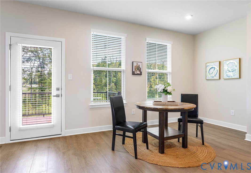 1255 Lazy River Road Midlothian, VA 23114 - Photo 14 of 27 a view of a dining room with furniture window and wooden floor