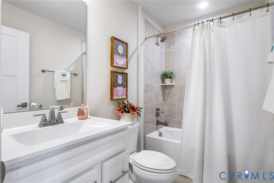1255 Lazy River Road Midlothian, VA 23114 - Photo 24 of 27 a bathroom with a sink a toilet and shower