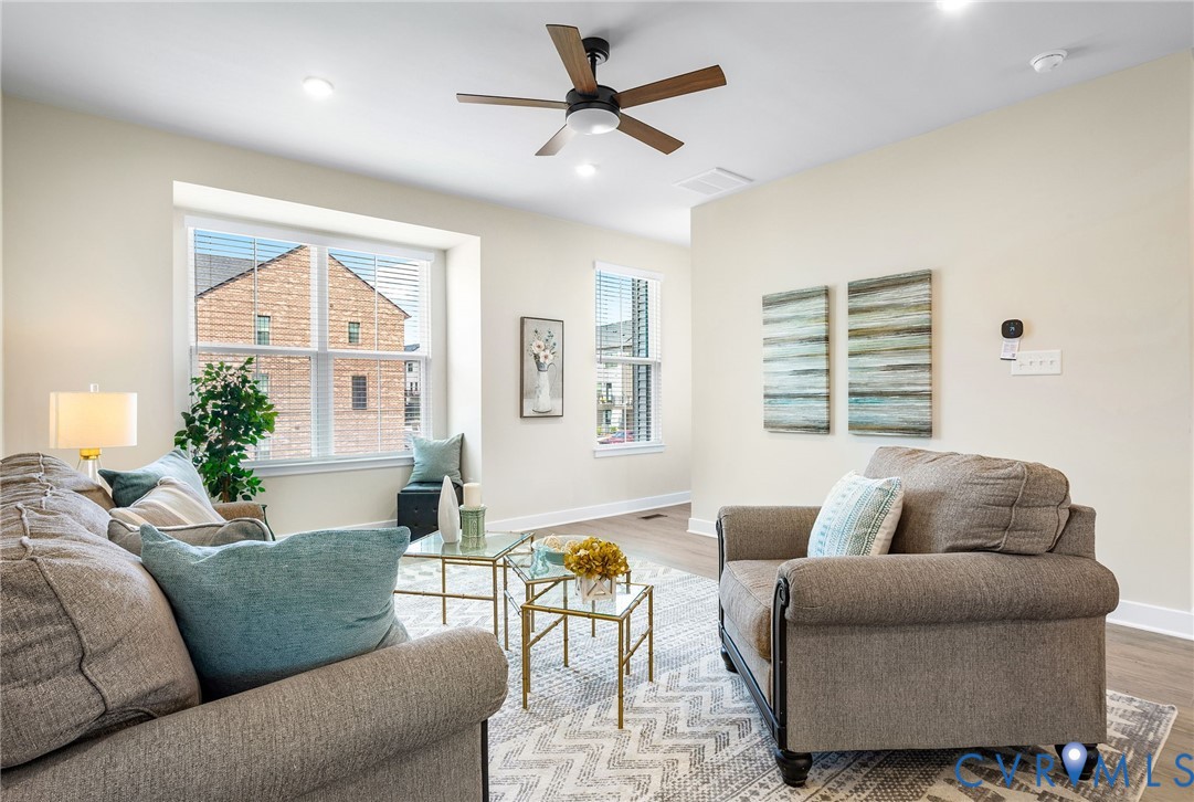 1255 Lazy River Road Midlothian, VA 23114 - Photo 6 of 27 a living room with furniture and a large window