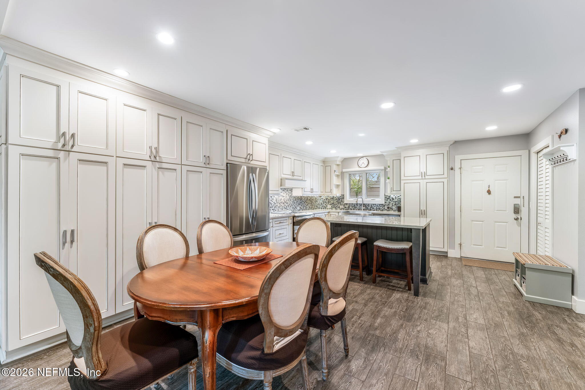 70 Fishermans Cove Road Ponte Vedra Beach, FL 32082 - Photo 16 of 60 a view of a a dining room with furniture window and wooden floor