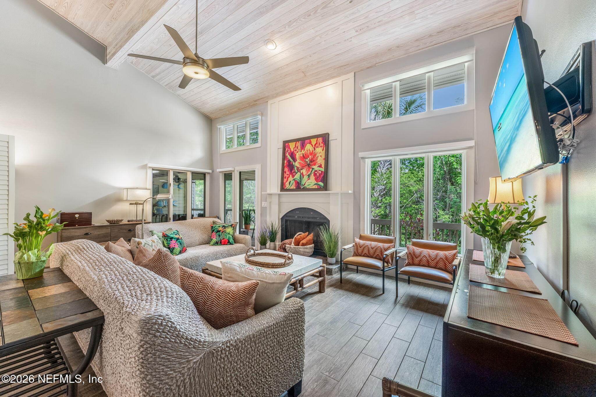 70 Fishermans Cove Road Ponte Vedra Beach, FL 32082 - Photo 17 of 60 a living room with furniture a flat screen tv and a fireplace