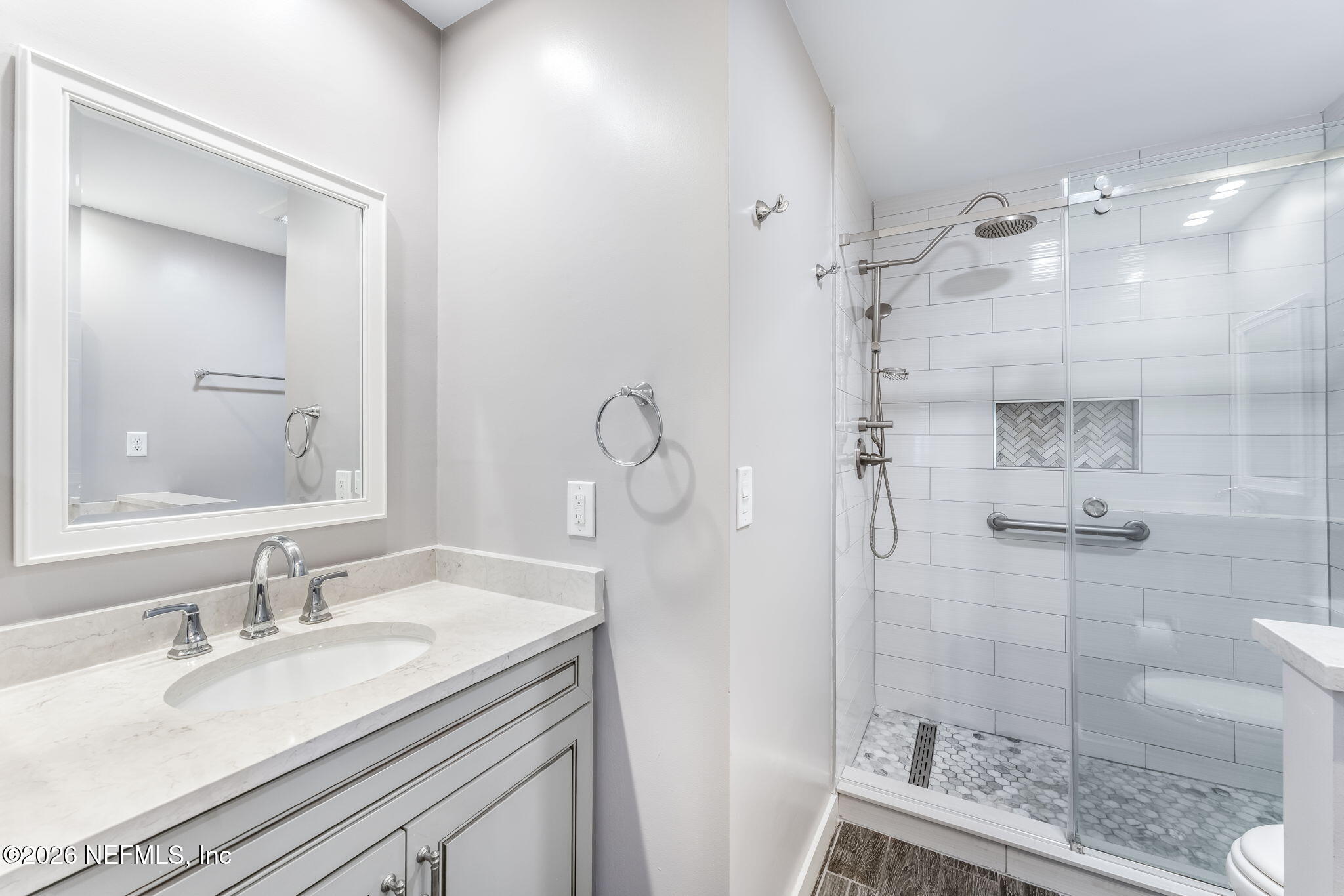 70 Fishermans Cove Road Ponte Vedra Beach, FL 32082 - Photo 25 of 60 a bathroom with a granite countertop sink mirror and shower