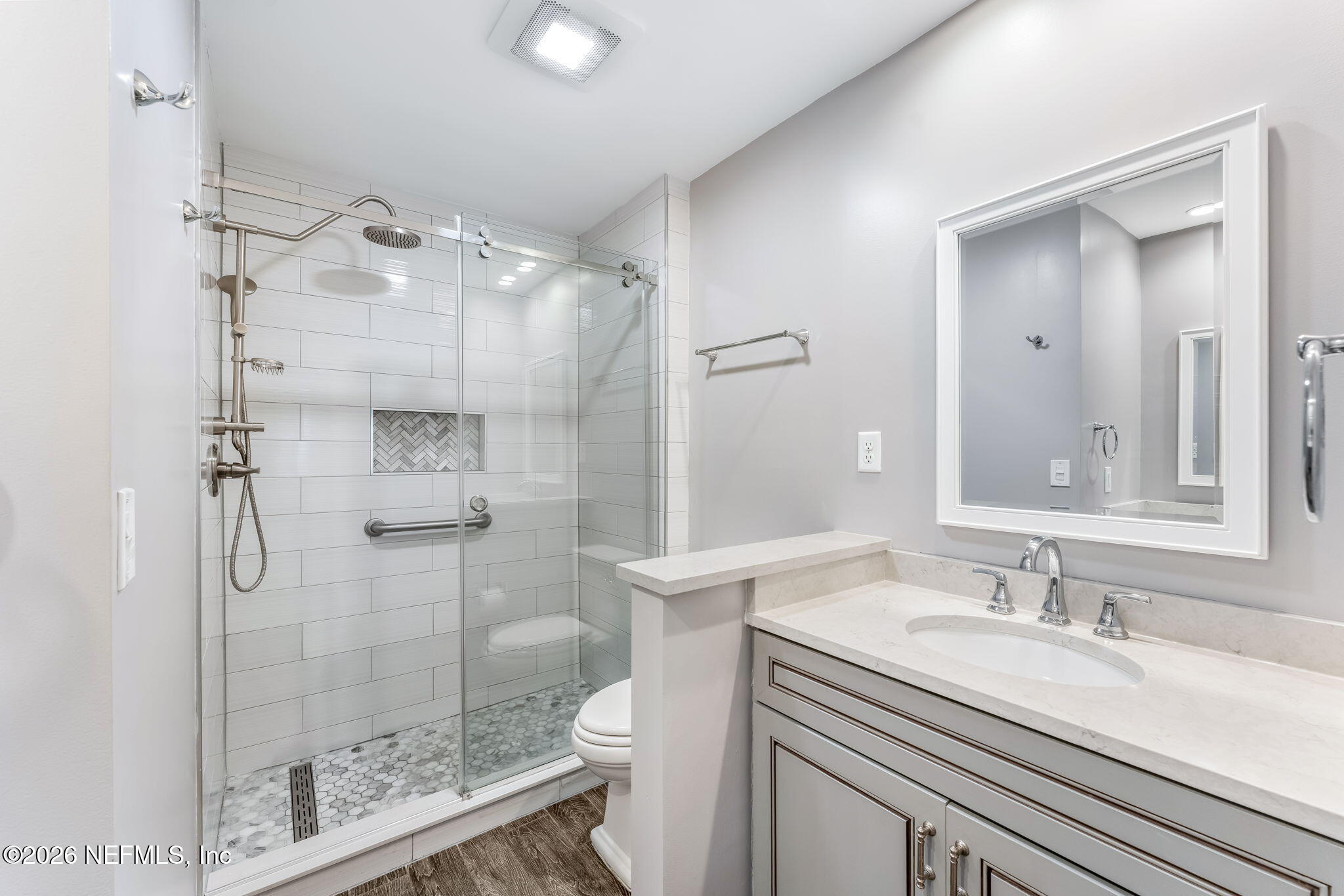 70 Fishermans Cove Road Ponte Vedra Beach, FL 32082 - Photo 26 of 60 a bathroom with a granite countertop sink a toilet and shower