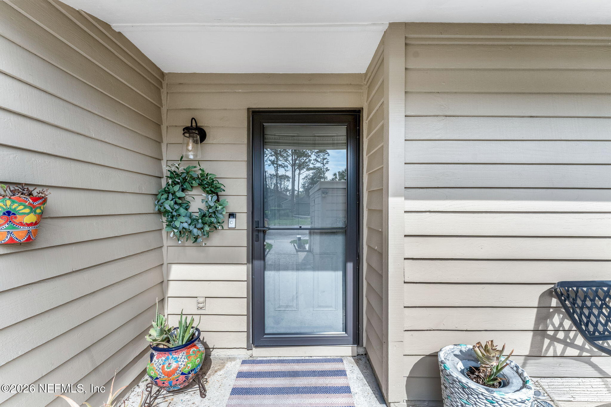 70 Fishermans Cove Road Ponte Vedra Beach, FL 32082 - Photo 5 of 60 a view of a entryway door of the house