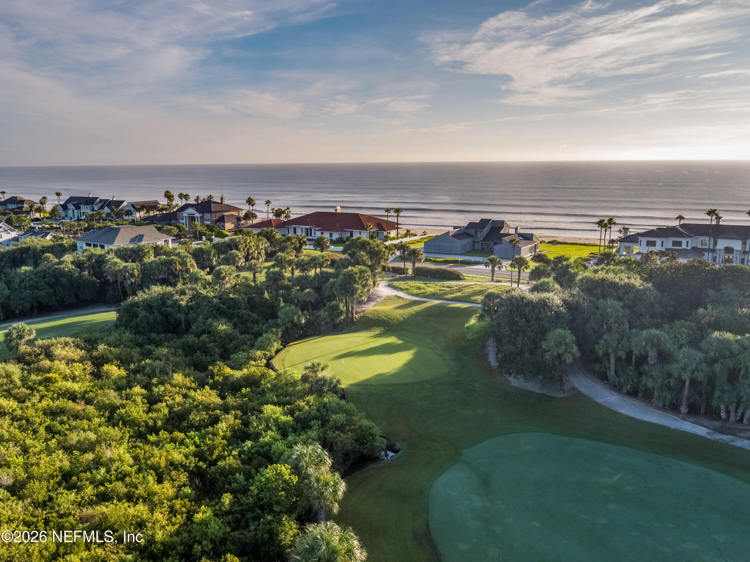 70 Fishermans Cove Road Ponte Vedra Beach, FL 32082 - Photo 52 of 60 a view of a lake with lawn chairs
