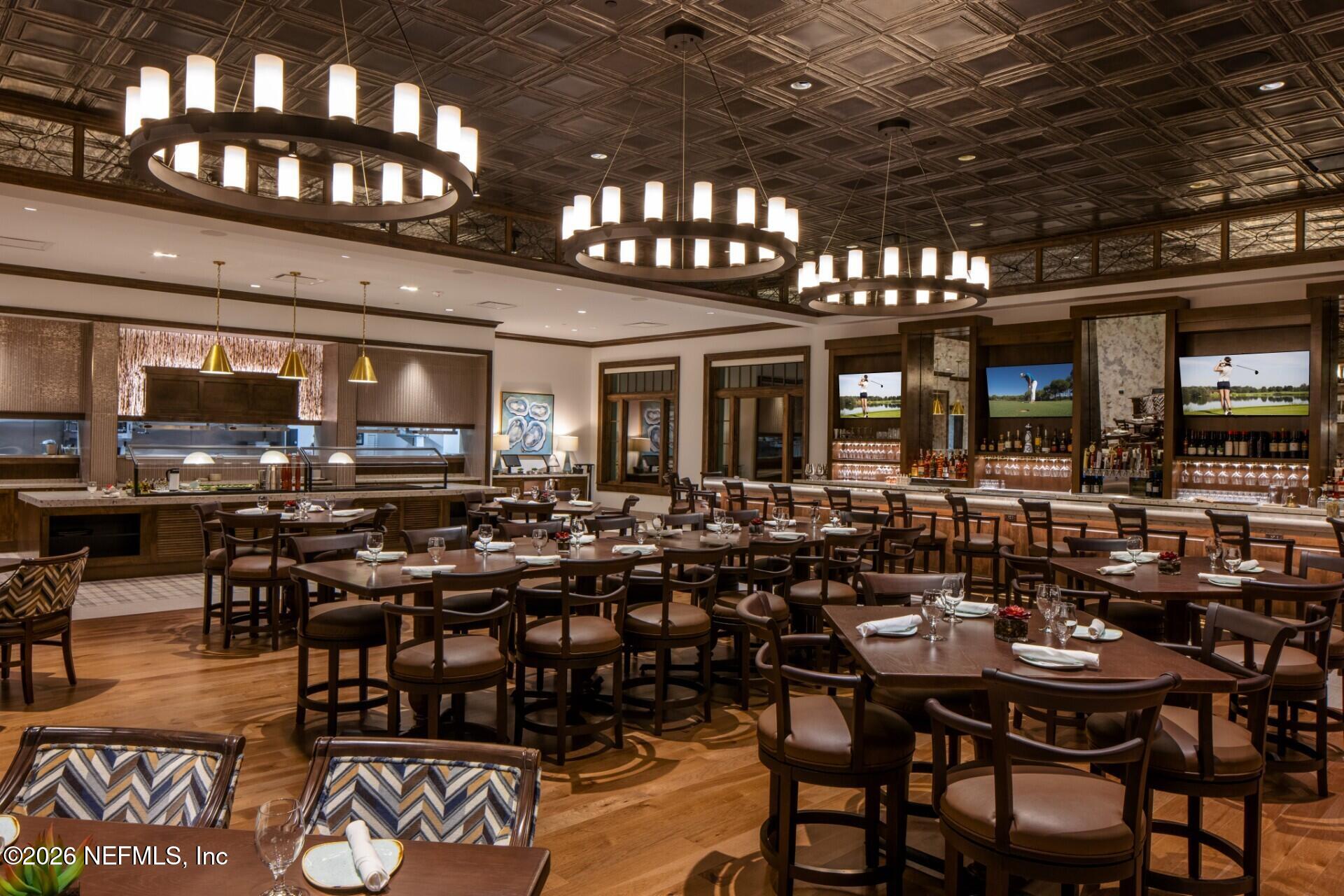 70 Fishermans Cove Road Ponte Vedra Beach, FL 32082 - Photo 56 of 60 a group of people sitting at tables