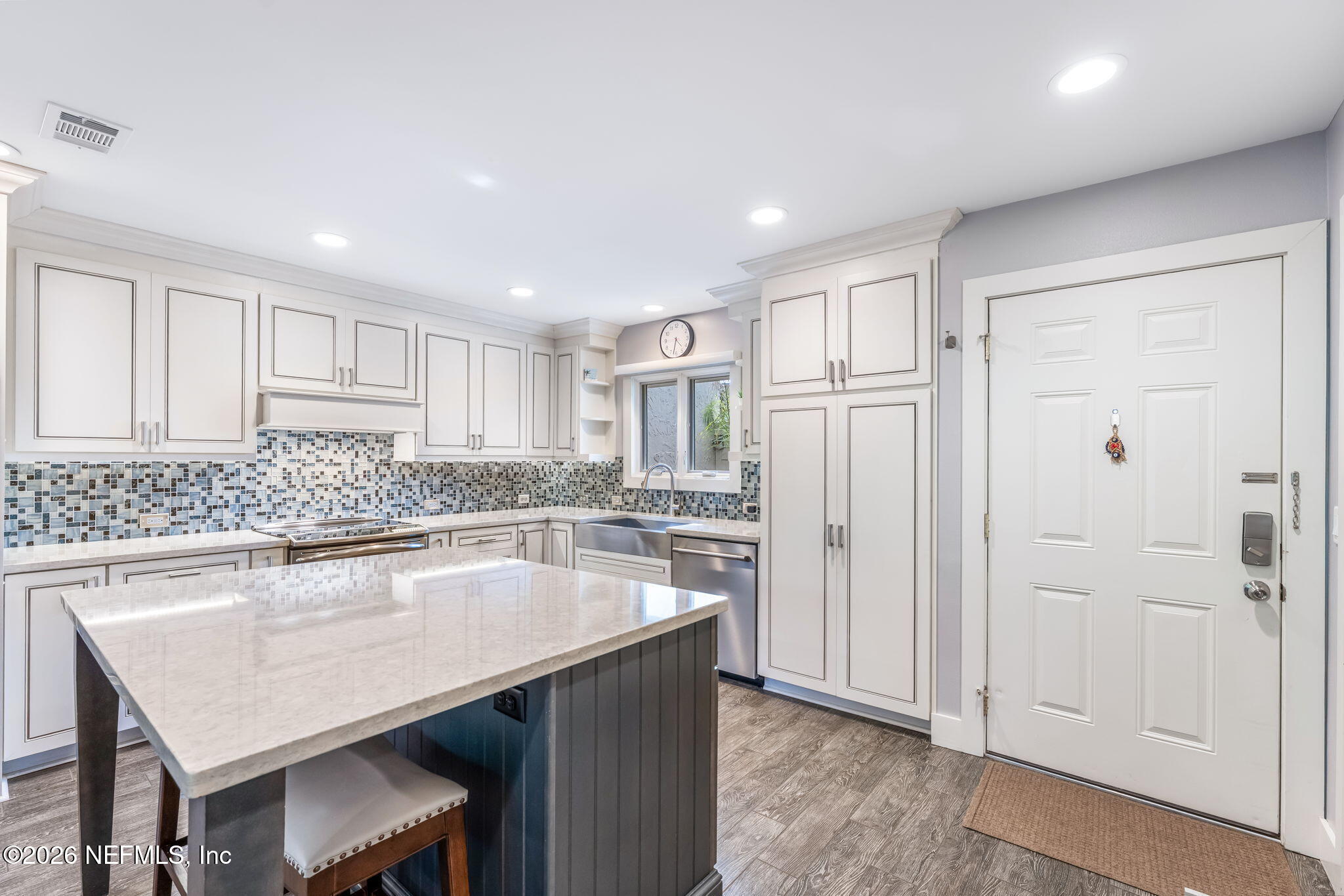 70 Fishermans Cove Road Ponte Vedra Beach, FL 32082 - Photo 6 of 60 a kitchen with stainless steel appliances granite countertop a sink and refrigerator
