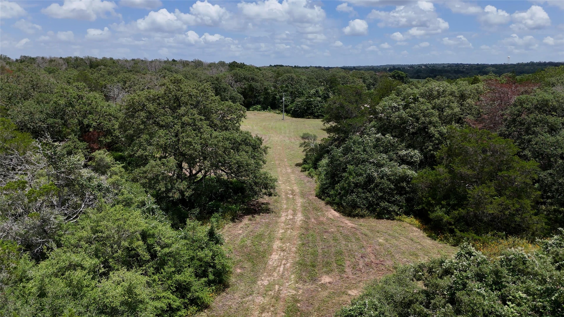 277 Meuth Cemetery Road Red Rock, TX 78662 - Photo 4 of 10 Vast natural landscape provides a secluded retreat for ultimate privacy and connection with nature.
