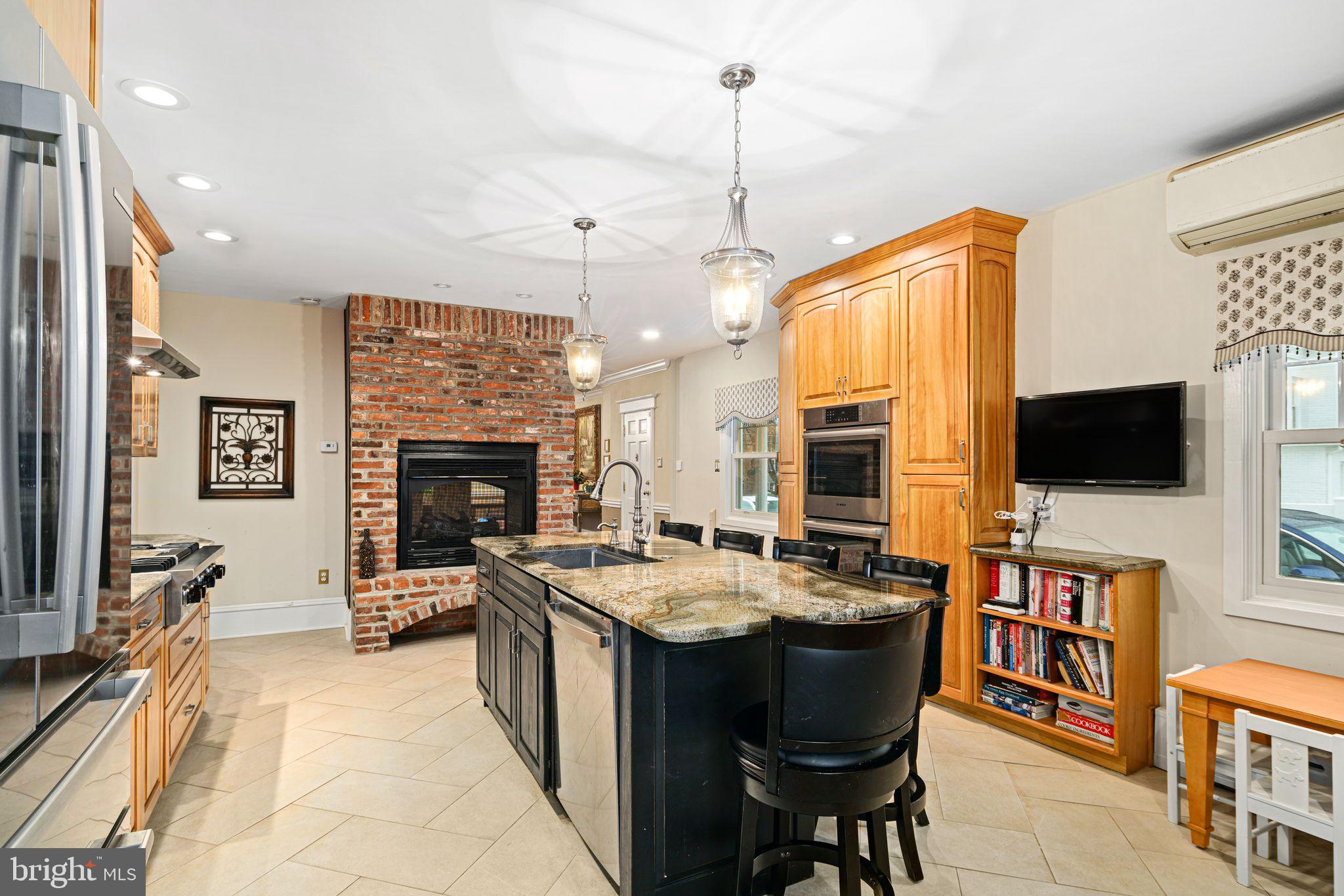 311 Chews Landing Road Haddonfield, NJ 08033 - Photo 12 of 31 a kitchen with a sink stove and microwave