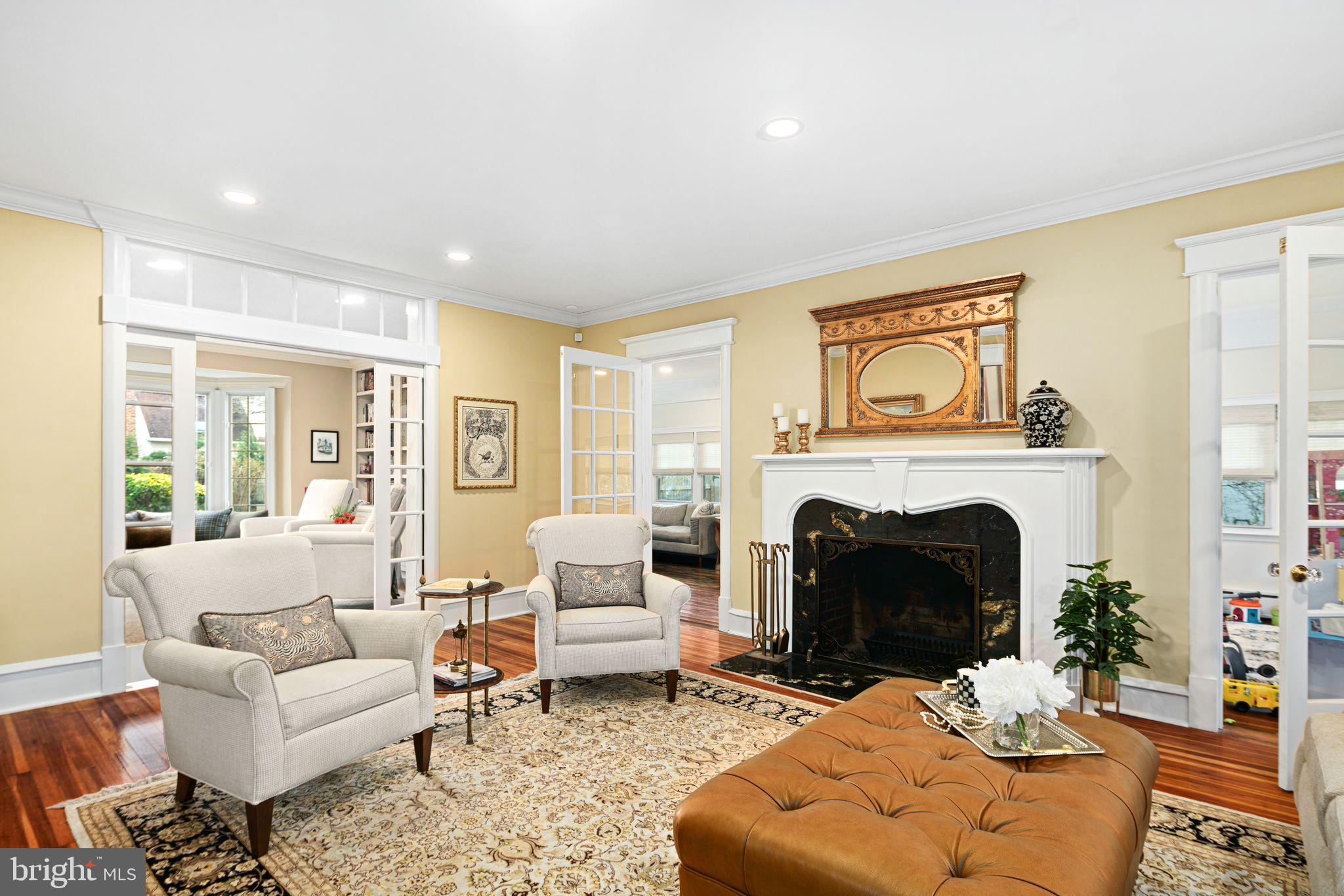 311 Chews Landing Road Haddonfield, NJ 08033 - Photo 15 of 31 a living room with furniture a rug and a fireplace