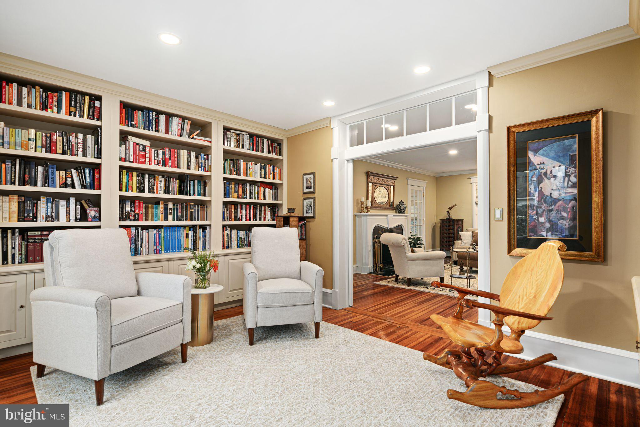 311 Chews Landing Road Haddonfield, NJ 08033 - Photo 16 of 31 a living room with furniture and a book shelf