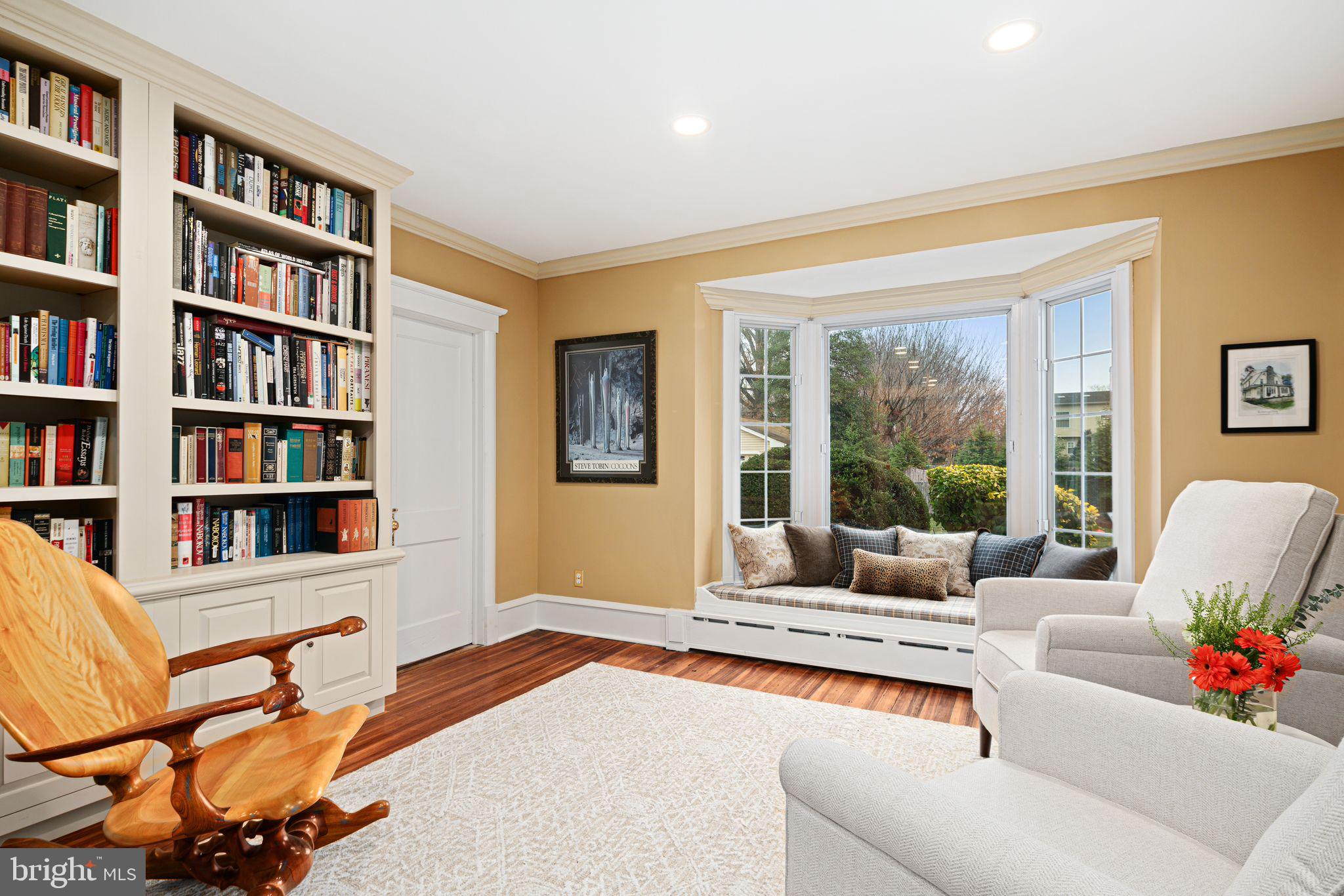 311 Chews Landing Road Haddonfield, NJ 08033 - Photo 27 of 31 a living room with furniture and a book shelf