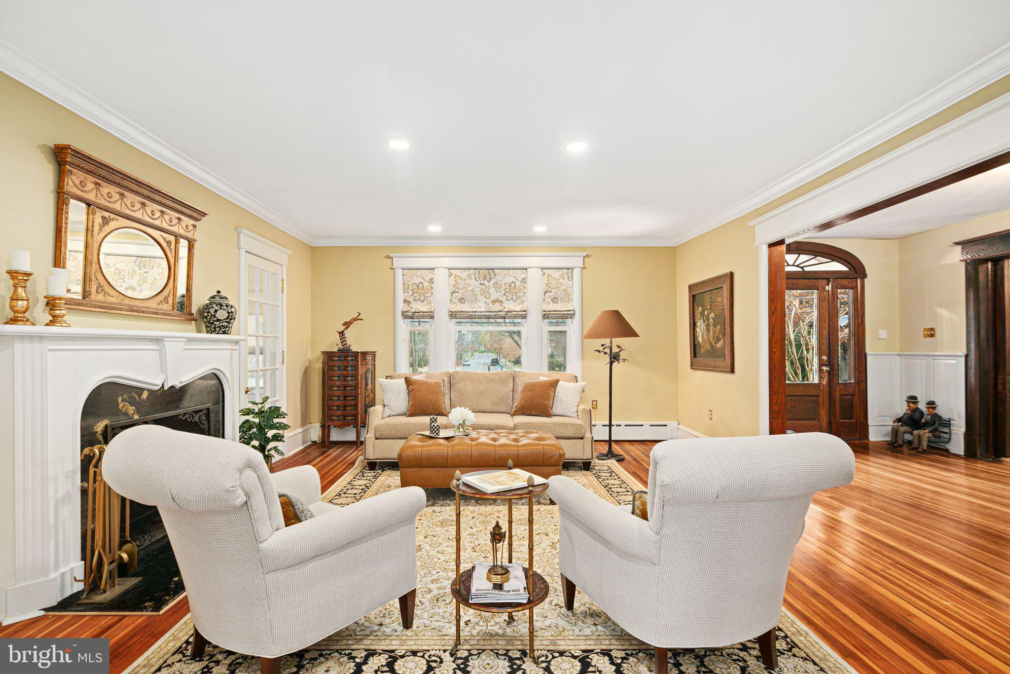 311 Chews Landing Road Haddonfield, NJ 08033 - Photo 29 of 31 a living room with fireplace furniture and a large window