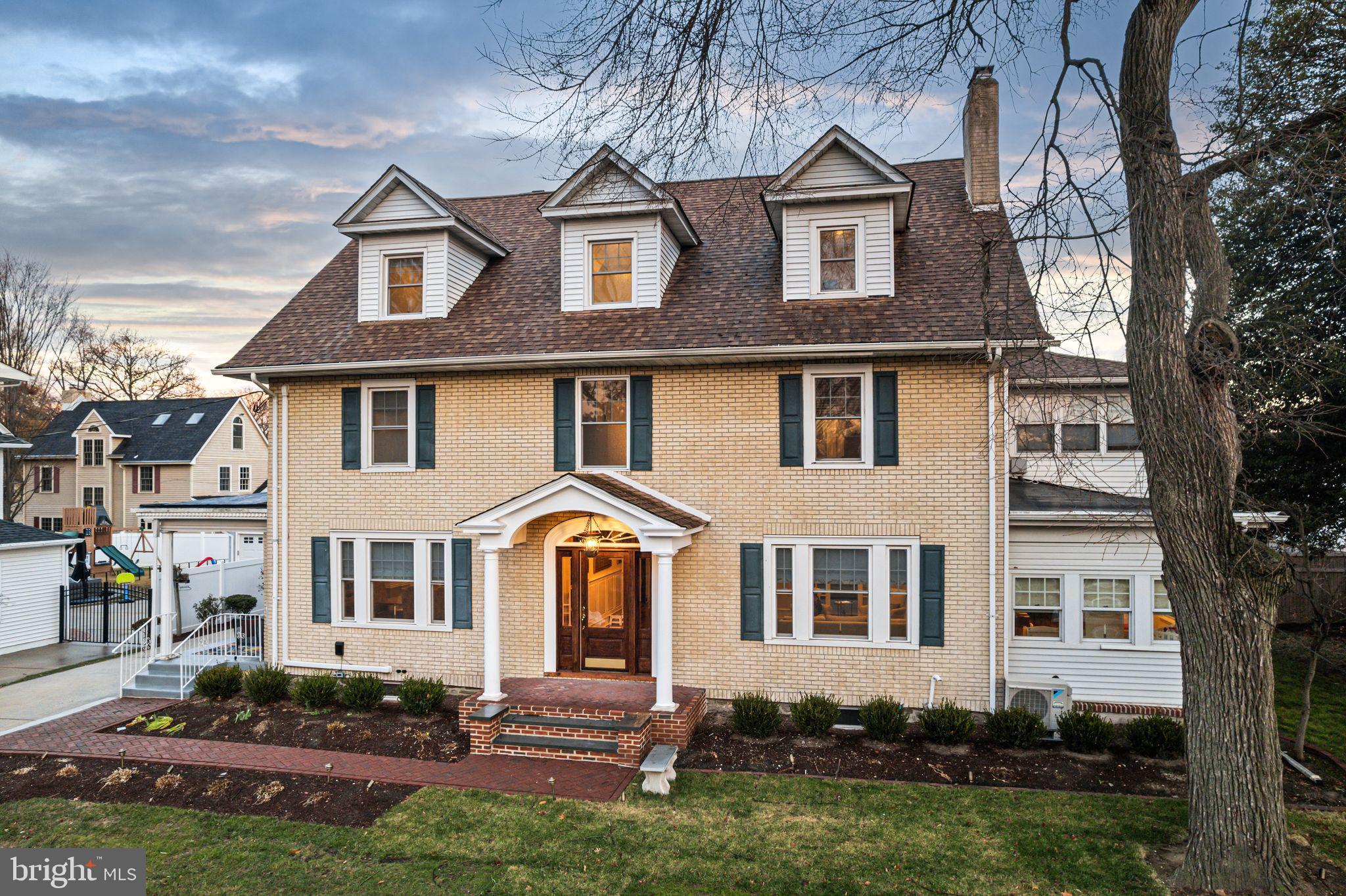 311 Chews Landing Road Haddonfield, NJ 08033 - Photo 4 of 31 a front view of a house with a yard