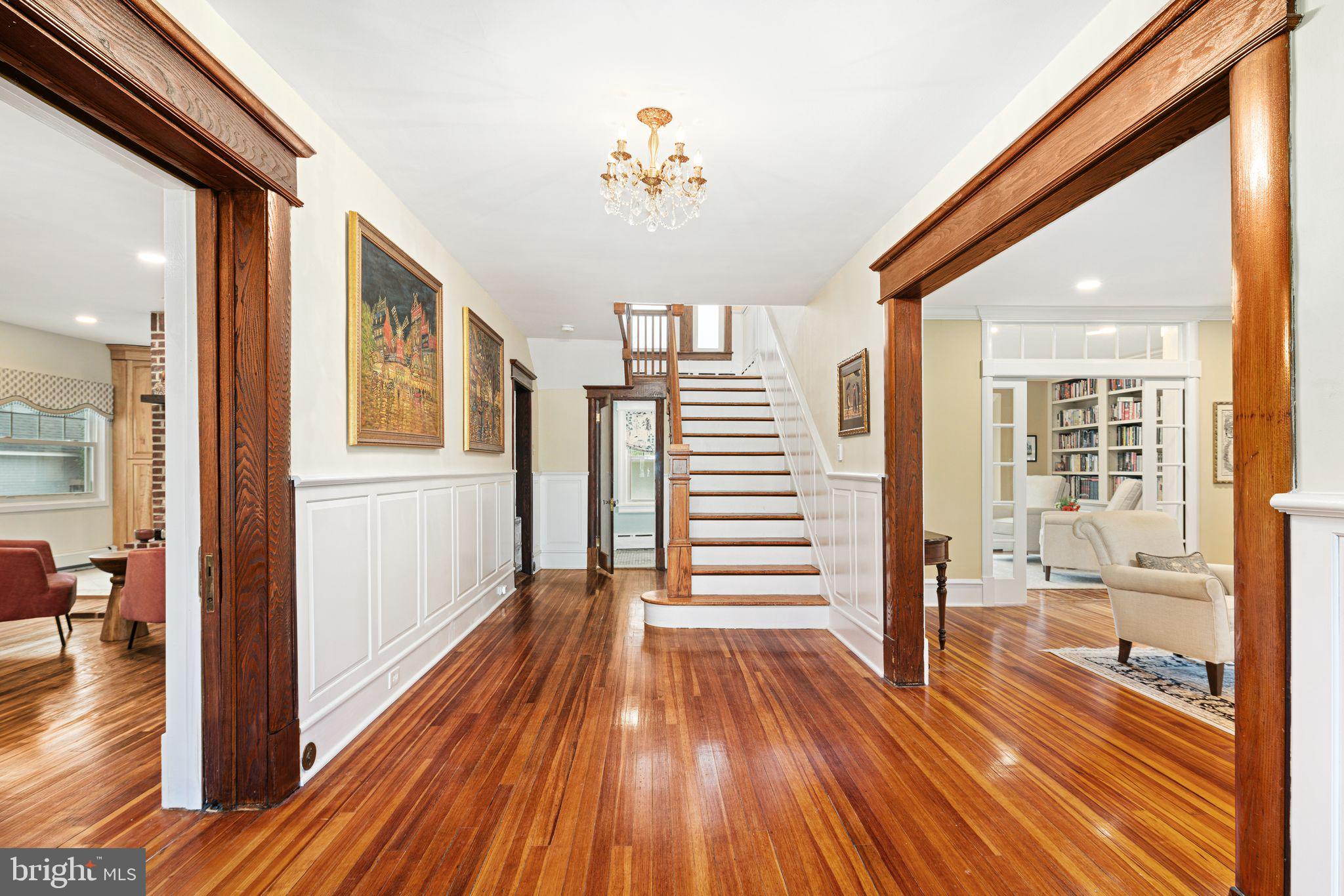 311 Chews Landing Road Haddonfield, NJ 08033 - Photo 9 of 31 a view of a room with wooden floor and stairs