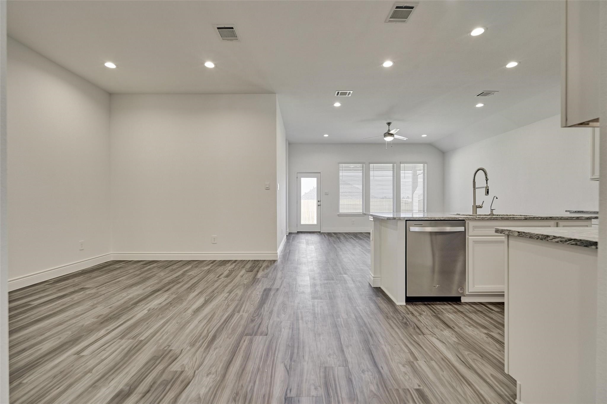 981 Youth Water Road Montgomery, TX 77316 - Photo 16 of 43 a view of kitchen with sink and refrigerator